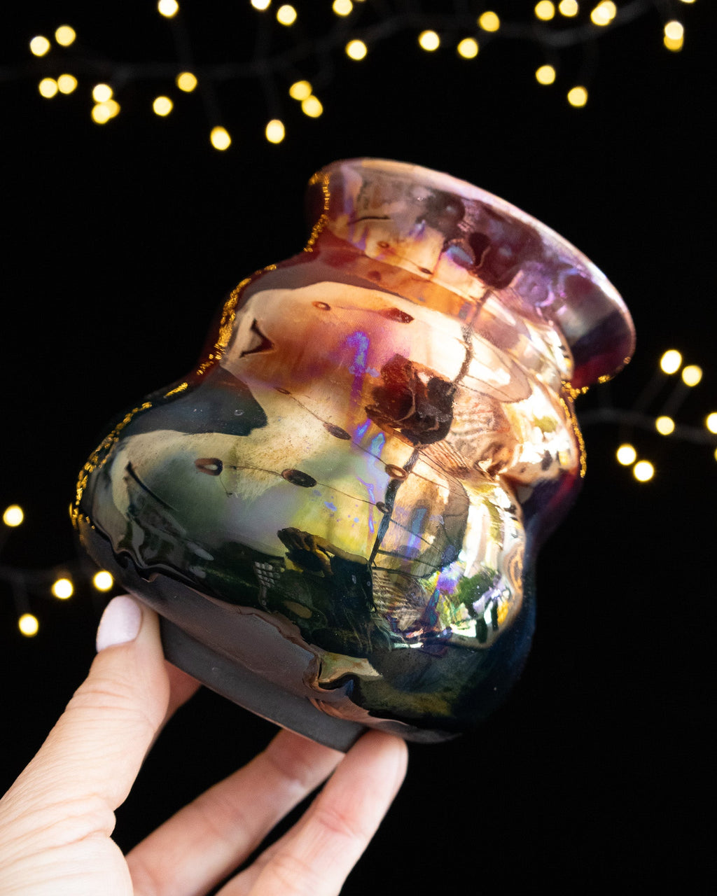 Close detail of iridescent luster glaze on handmade porcelain