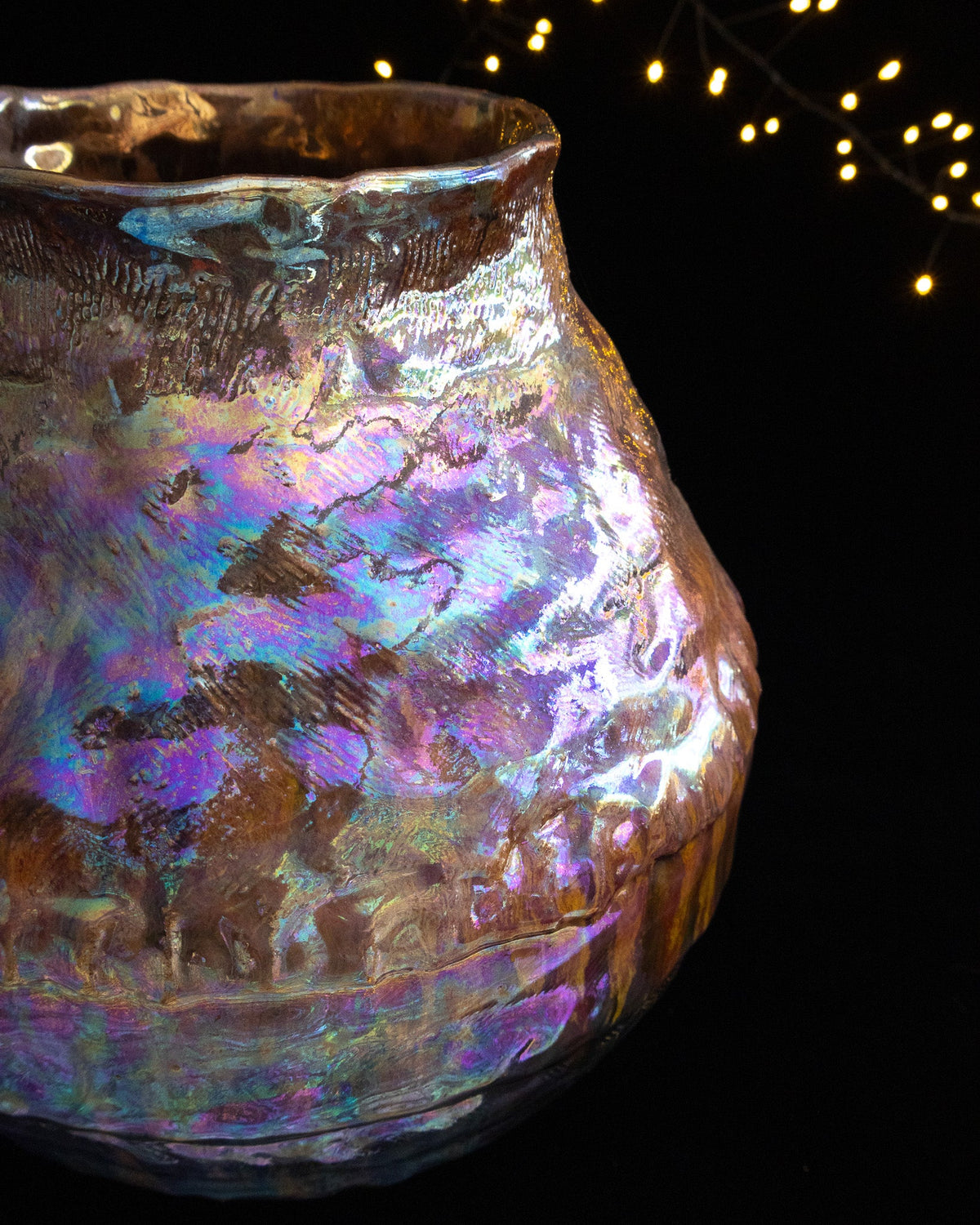 Angled view of a large lusterware pot showing the shoulder