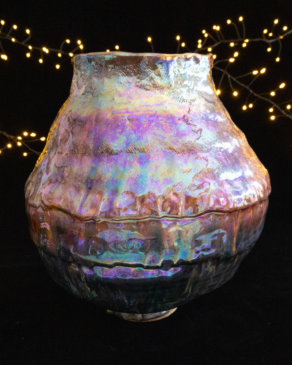 Large hand built stoneware pot with pink and teal iridescent luster