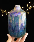 Handmade lusterware daydream bottle in blue and violet with teal at the base