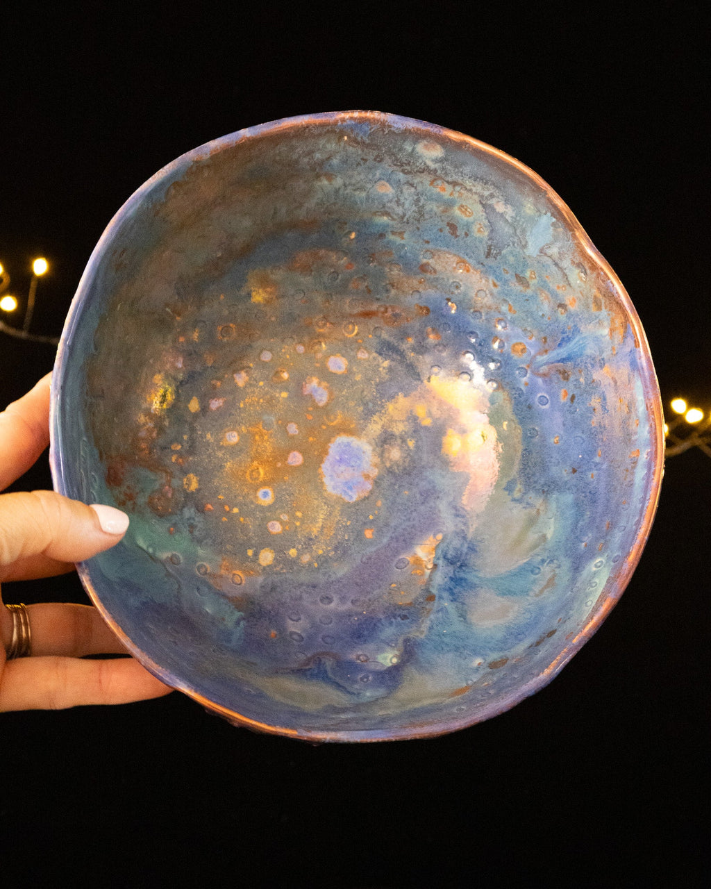 Underside of a partly fired porcelain lusterware bowl
