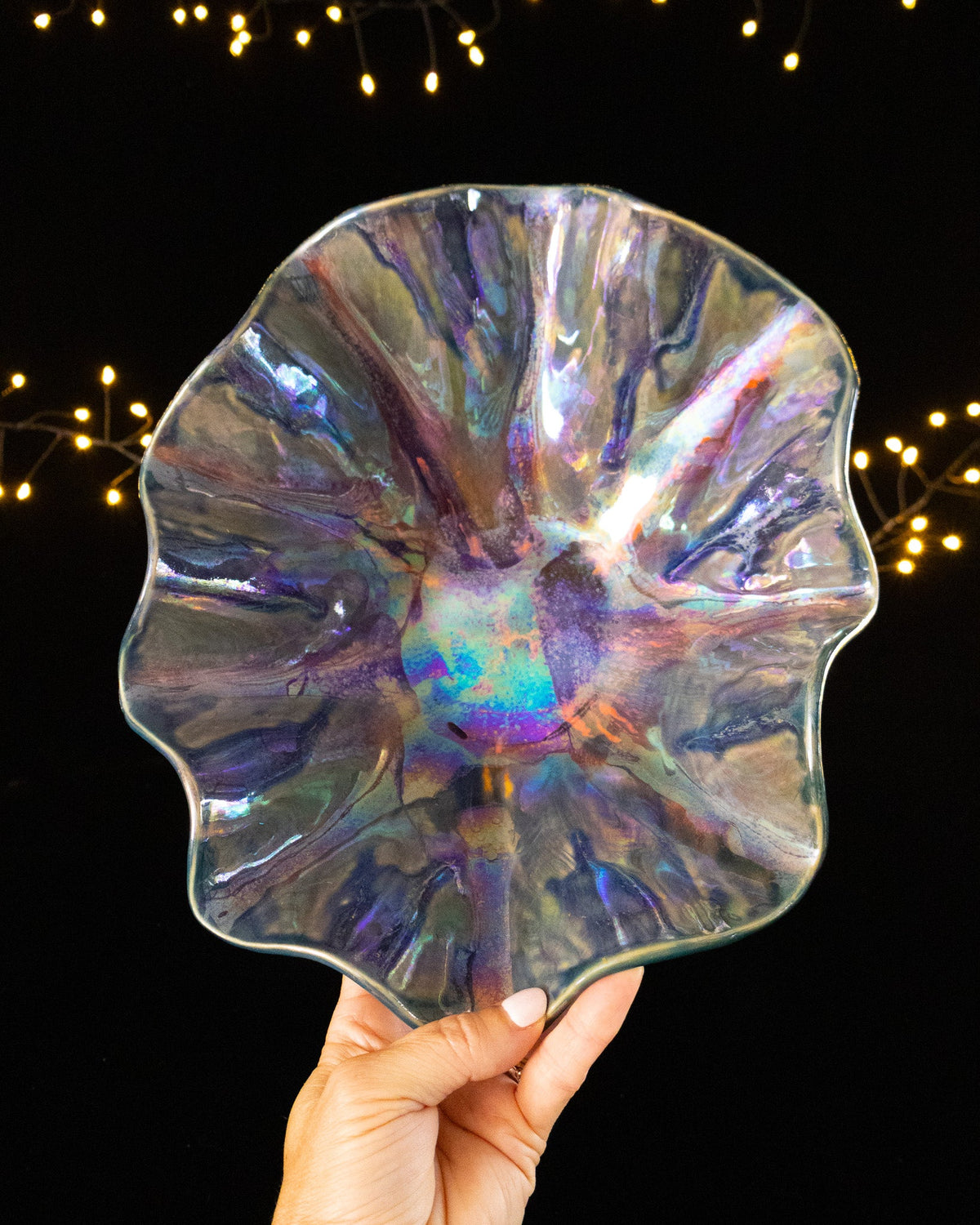 Ruffled lusterware bloom sculpture seen from the front