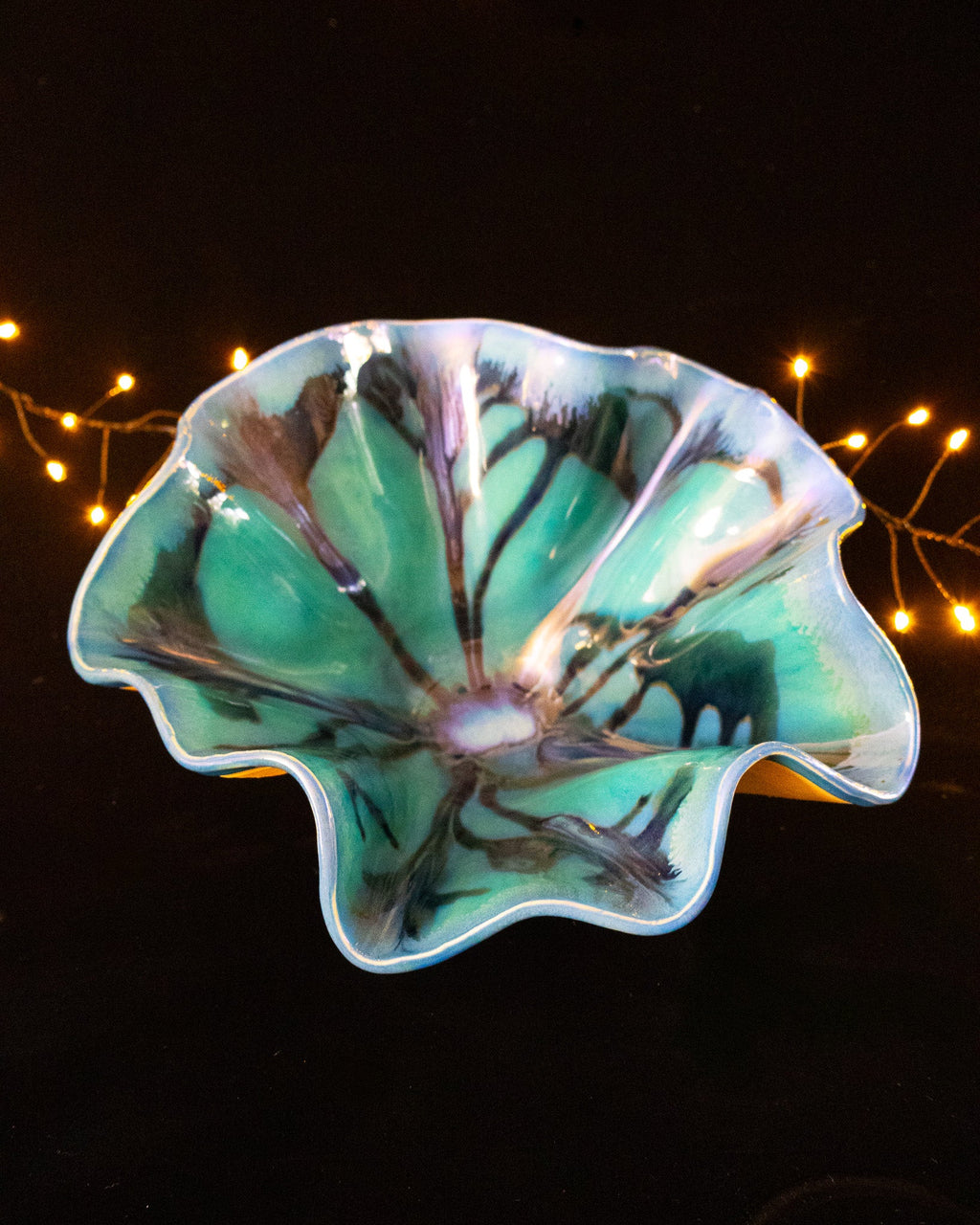 Ruffled hand built stoneware bloom sculpture in sea green