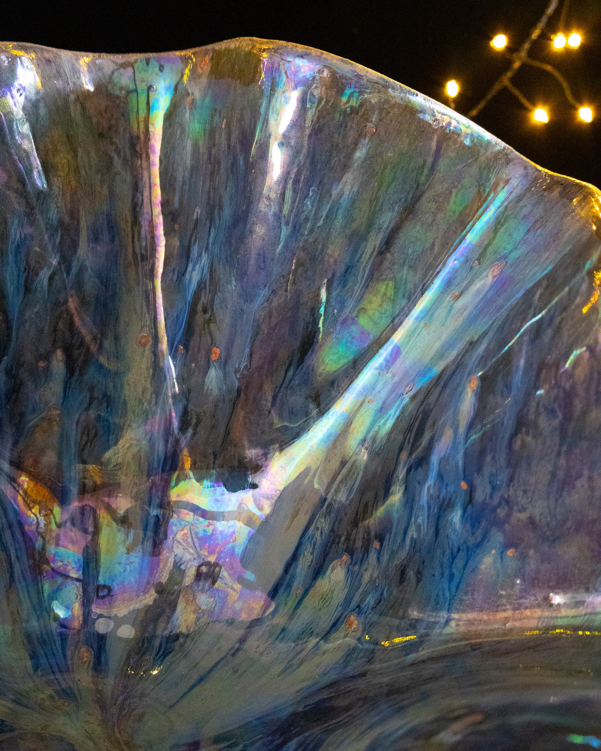 Close detail of rainbow banding across in-glaze luster