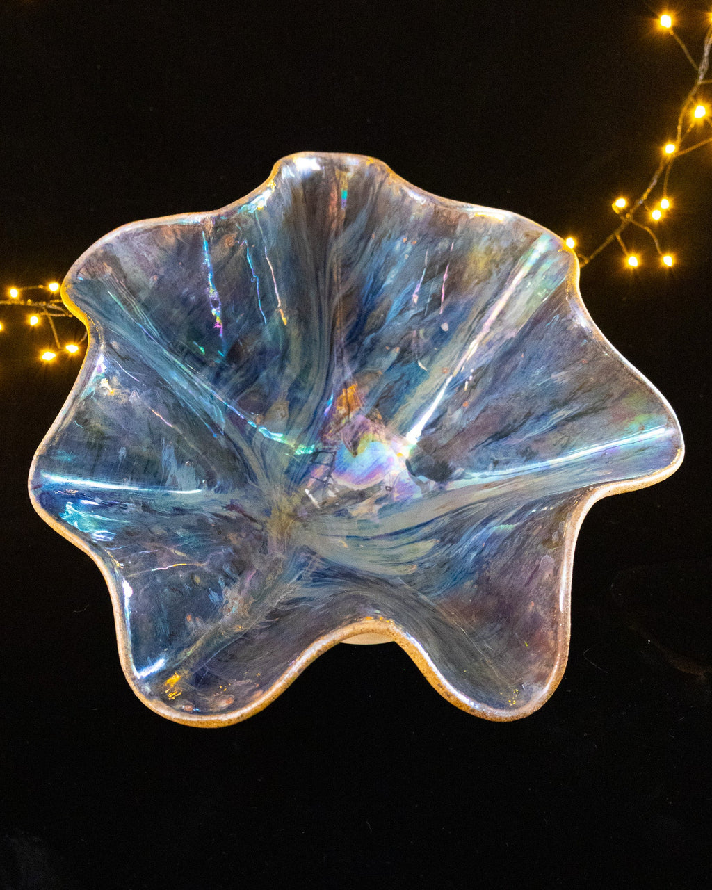 Hand built stoneware bloom sculpture in silver and blue iridescence