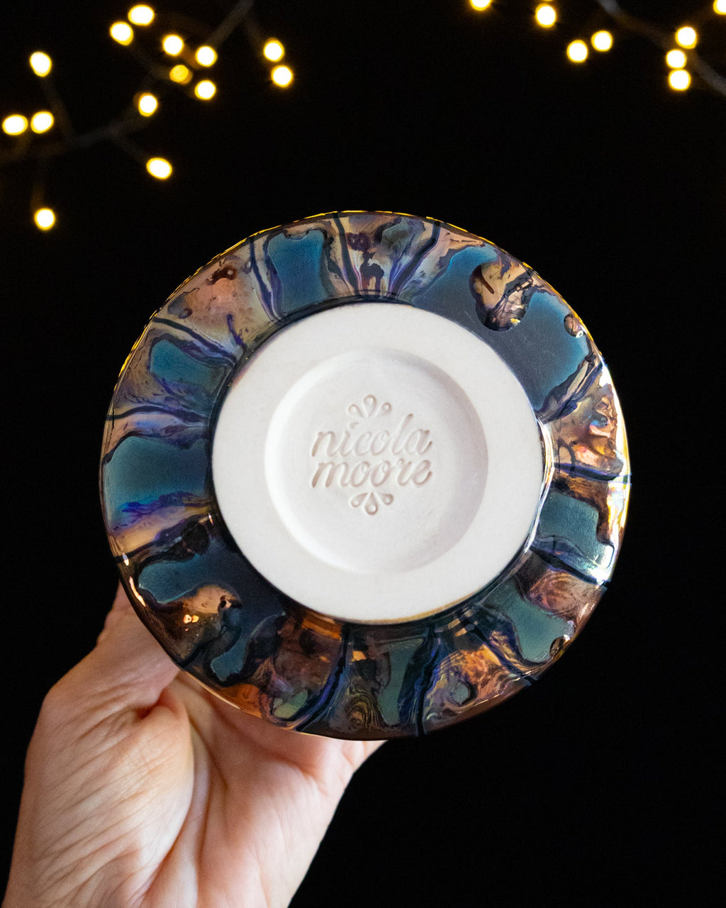 Underside of a lusterware ritual cup with unglazed foot