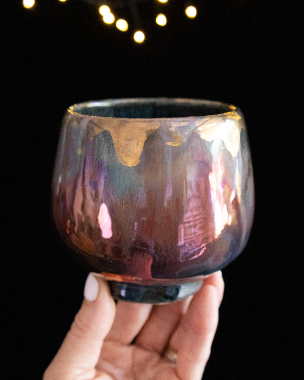 Rose and bronze in-glaze luster cooling to deep blue on porcelain