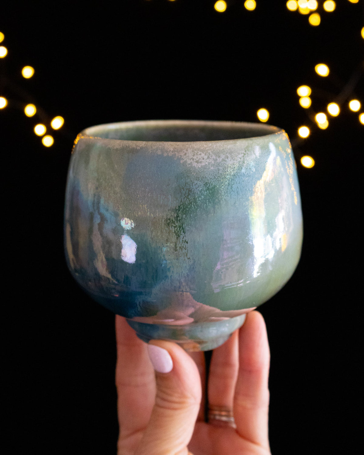 Pale sage in-glaze luster with a pearl shimmer on wheel thrown porcelain