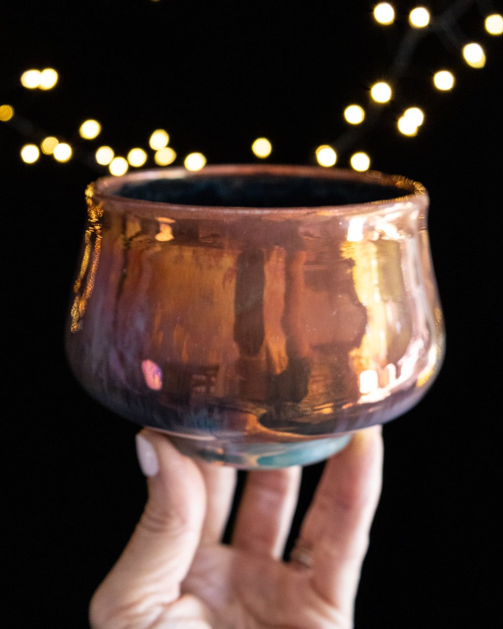 Handmade lusterware ritual cup in deep amber with a flared rim