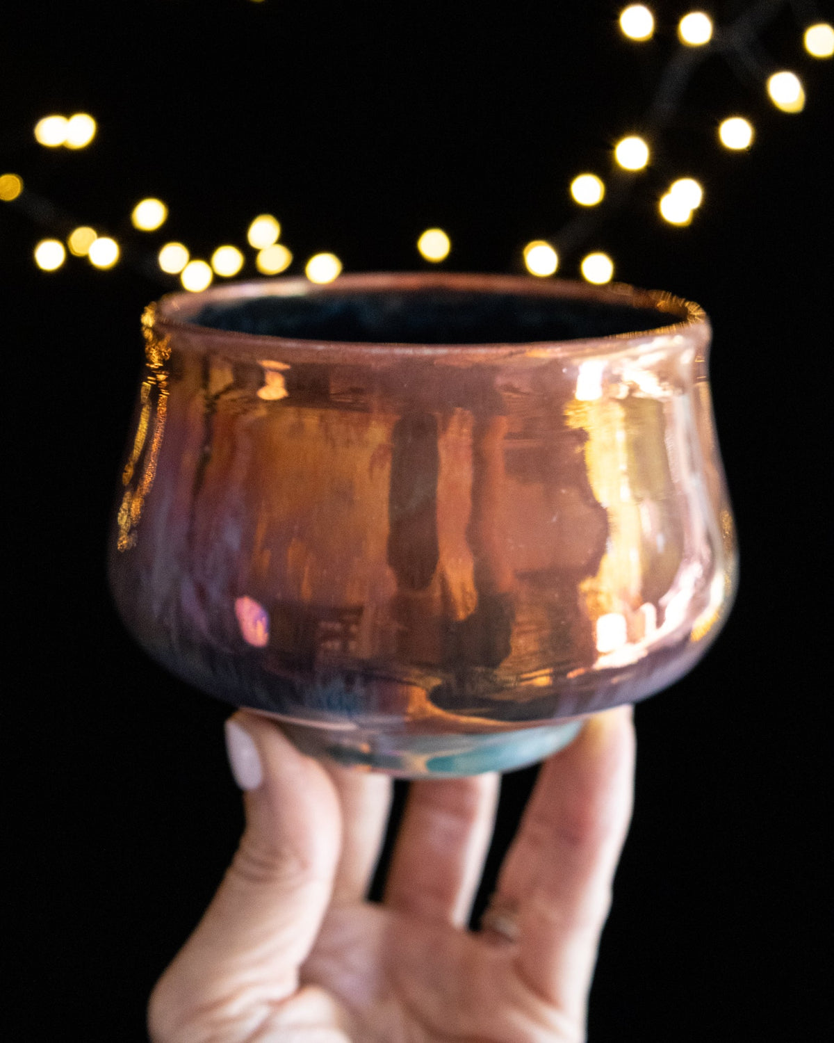 Handmade lusterware ritual cup in deep amber with a flared rim
